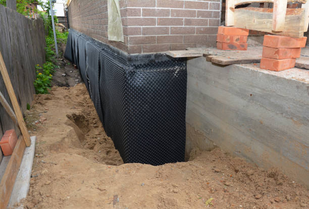 SJ Waterproofing Pros technician performing targeted Emergency Waterproofing assessment in Monroe, TN